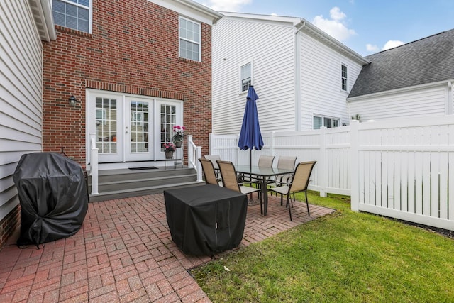 5119 Butterworth Green Dr, New Albany, OH 43054 - view of patio with french doors, area for grilling, and outdoor dining area