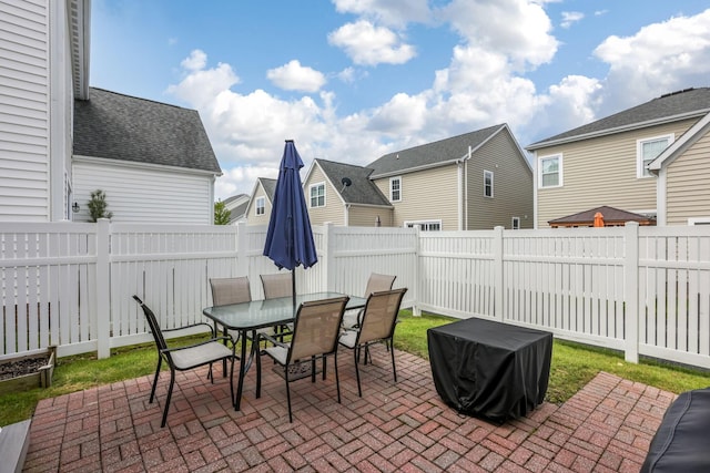 5119 Butterworth Green Dr, New Albany, OH 43054 - view of patio / terrace featuring a fenced backyard, outdoor dining space, a residential view, and area for grilling