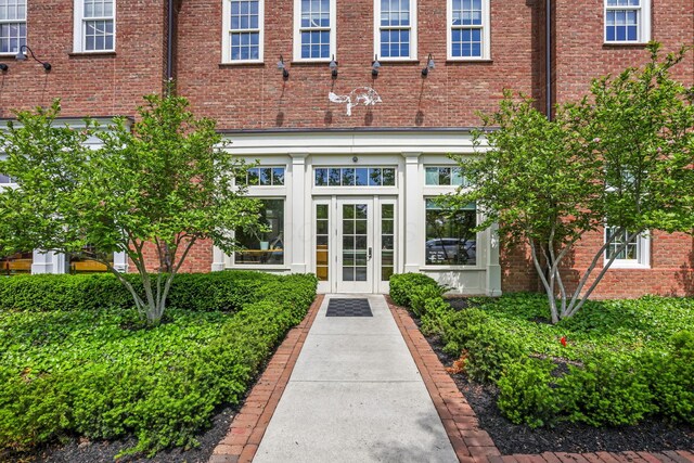 5119 Butterworth Green Dr, New Albany, OH 43054 - view of exterior entry with french doors and brick siding