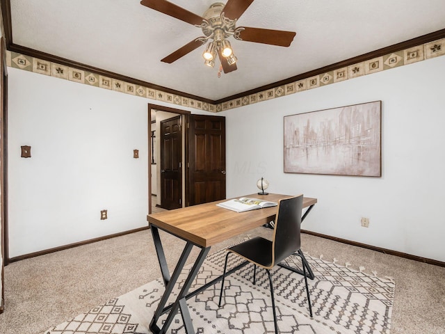 6079 Catawba Dr, Grove City, OH 43123 - office area with light colored carpet, ceiling fan, baseboards, and ornamental molding