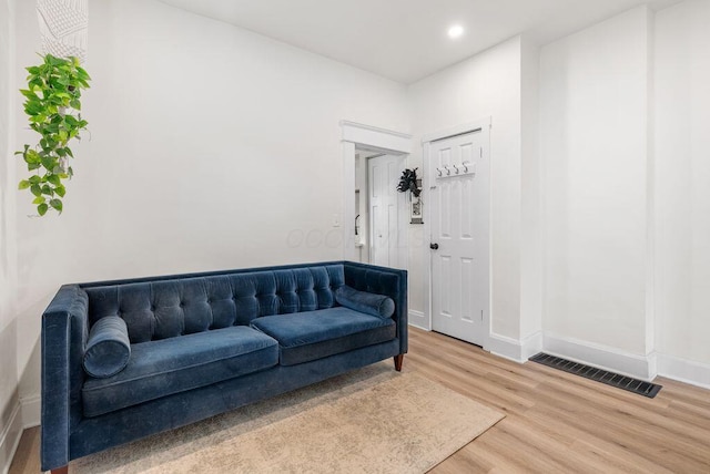 357 E Welch Ave, Columbus, OH 43207 - living area with light wood-style floors, baseboards, and recessed lighting