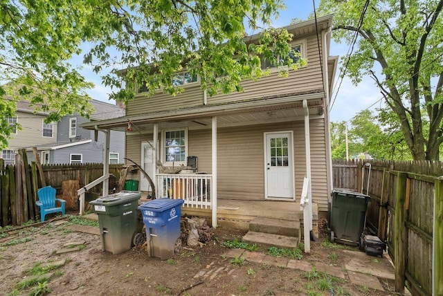 357 E Welch Ave, Columbus, OH 43207 - rear view of house featuring covered porch and a fenced backyard