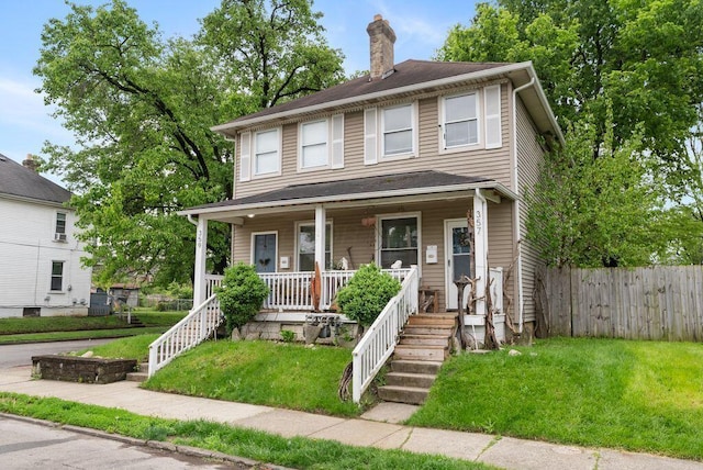 357 E Welch Ave, Columbus, OH 43207 - traditional style home with a chimney and covered porch