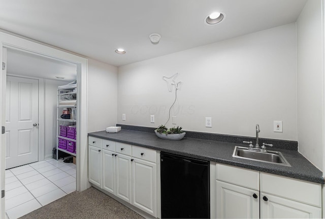 308 Jackson St, Columbus, OH 43206 - kitchen featuring a sink, dark countertops, white cabinetry, black dishwasher, and recessed lighting