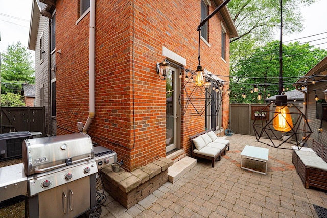 308 Jackson St, Columbus, OH 43206 - view of patio with grilling area, fence, and cooling unit