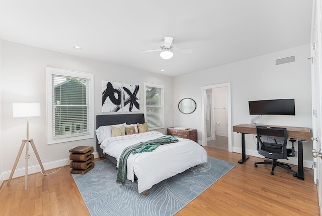 308 Jackson St, Columbus, OH 43206 - bedroom with light wood-style flooring, baseboards, an office area, a ceiling fan, and recessed lighting
