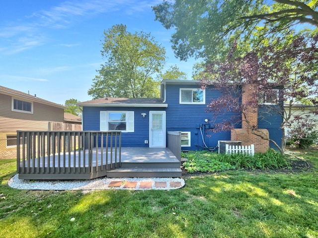 3495 Halpern St, Columbus, OH 43230 - back of property with a lawn and a wooden deck