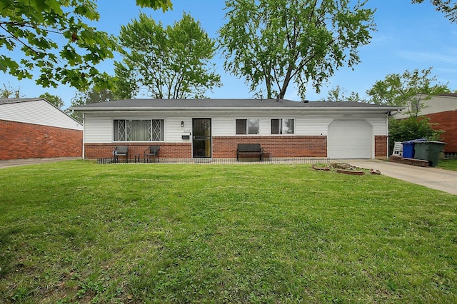 2894 Langfield Dr, Columbus, OH 43209 - single story home featuring brick siding, an attached garage, a front lawn, and driveway