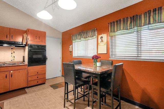 2894 Langfield Dr, Columbus, OH 43209 - dining area featuring vaulted ceiling and light flooring
