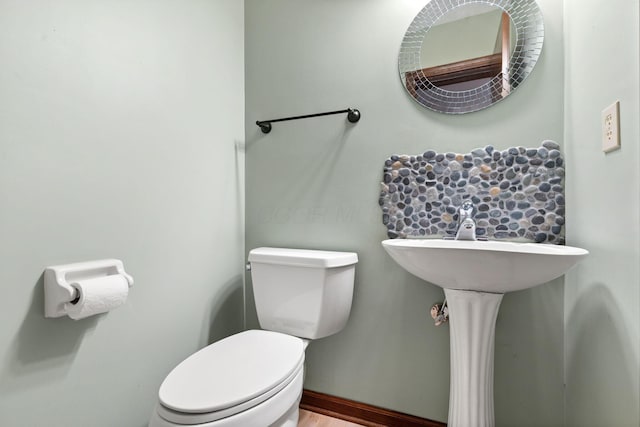 750 Pepper Ct, Westerville, OH 43082 - half bathroom featuring toilet and wood finished floors