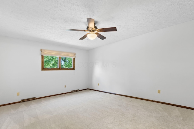 750 Pepper Ct, Westerville, OH 43082 - spare room with light colored carpet, a ceiling fan, and a textured ceiling