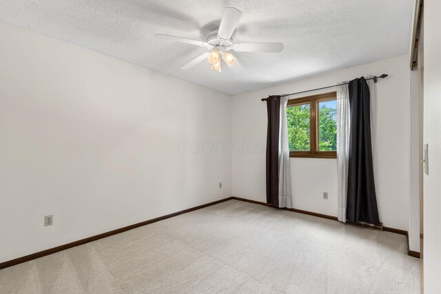 750 Pepper Ct, Westerville, OH 43082 - unfurnished room with a textured ceiling, light colored carpet, and a ceiling fan