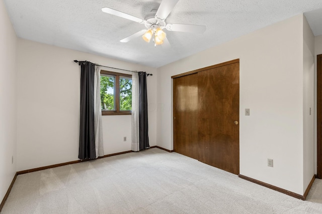 750 Pepper Ct, Westerville, OH 43082 - unfurnished bedroom with light colored carpet, a textured ceiling, ceiling fan, and a closet