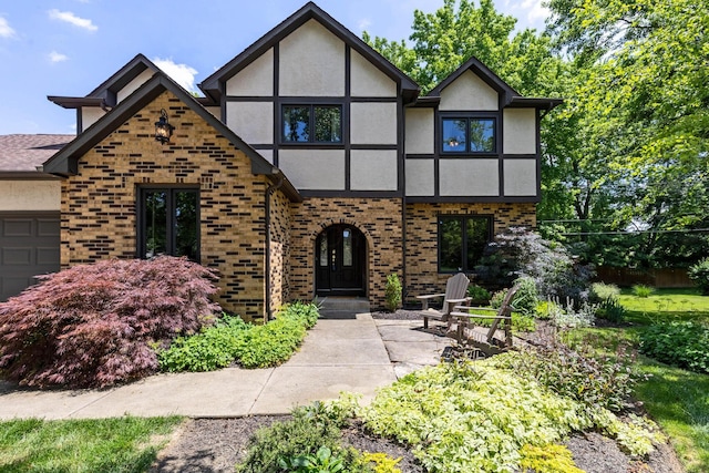750 Pepper Ct, Westerville, OH 43082 - english style home featuring stucco siding, brick siding, and a garage