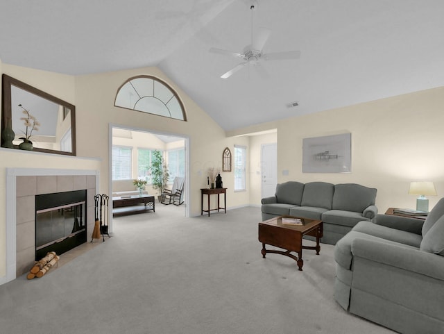 676 Albion Pl, Westerville, OH 43082 - living area with carpet floors, a tile fireplace, high vaulted ceiling, and ceiling fan