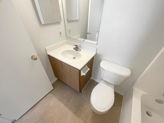 3118 Legion Ln, Columbus, OH 43232 - bathroom with toilet, vanity, tile patterned floors, and baseboards