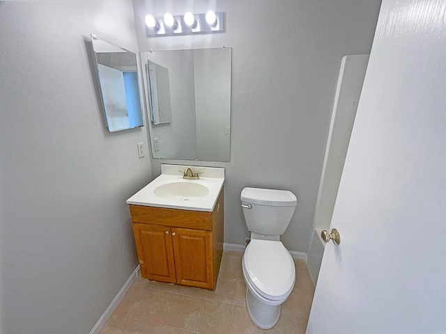 3118 Legion Ln, Columbus, OH 43232 - bathroom featuring toilet, tile patterned flooring, vanity, and baseboards