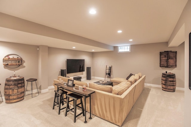 living room featuring light carpet, recessed lighting, and baseboards