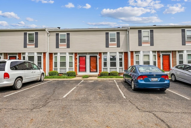view of front of home featuring uncovered parking
