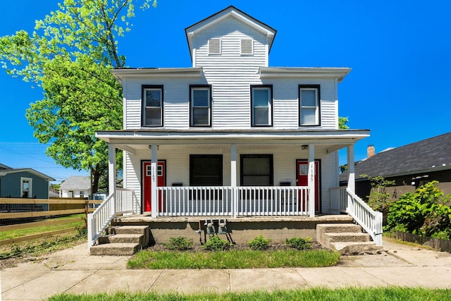 1165 Wager St Unit 1165-1167, Columbus, OH 43206 - view of front of house with covered porch and fence