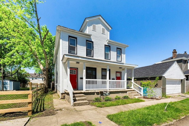1165 Wager St Unit 1165-1167, Columbus, OH 43206 - view of front of property featuring covered porch and fence