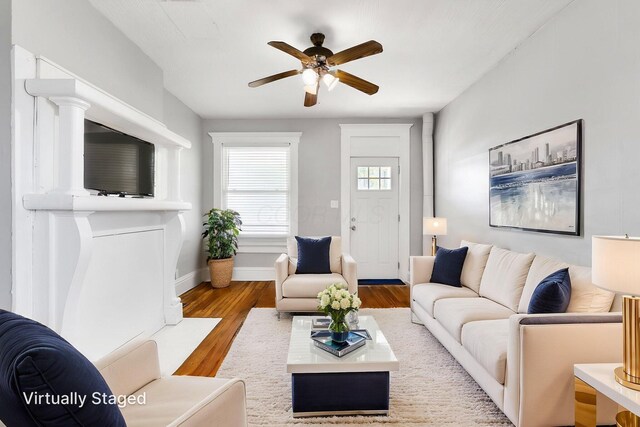 1165 Wager St Unit 1165-1167, Columbus, OH 43206 - living area featuring ceiling fan, wood finished floors, and baseboards