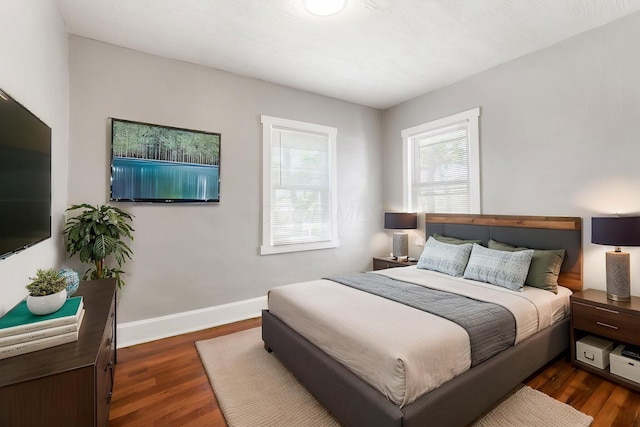 1165 Wager St Unit 1165-1167, Columbus, OH 43206 - bedroom with dark wood-style flooring and baseboards