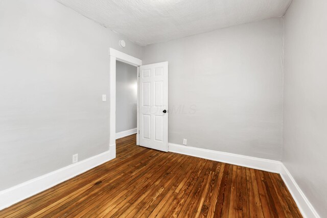 1165 Wager St Unit 1165-1167, Columbus, OH 43206 - unfurnished room with baseboards and dark wood-style floors