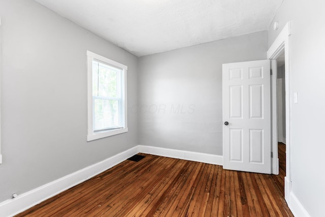 1165 Wager St Unit 1165-1167, Columbus, OH 43206 - spare room with baseboards and dark wood finished floors