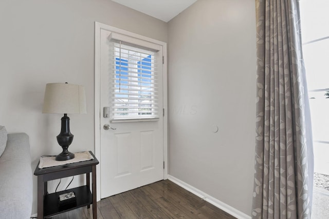 4712 Shalers Dr Unit 54A, Columbus, OH 43228 - doorway to outside featuring dark wood-style floors and baseboards