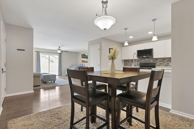 4712 Shalers Dr Unit 54A, Columbus, OH 43228 - dining room with baseboards, a ceiling fan, wood finished floors, and recessed lighting