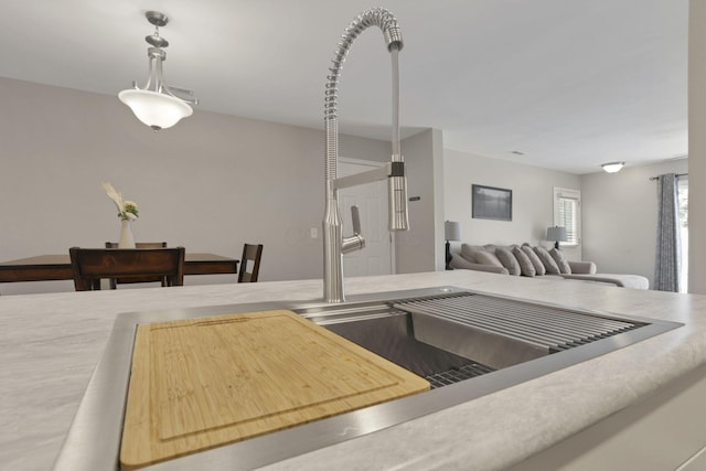 4712 Shalers Dr Unit 54A, Columbus, OH 43228 - kitchen with open floor plan, decorative light fixtures, and light countertops