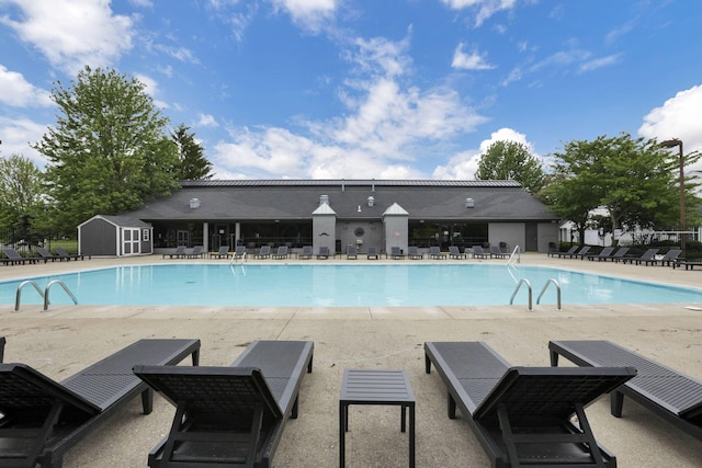 4712 Shalers Dr Unit 54A, Columbus, OH 43228 - community pool featuring a patio and a storage shed
