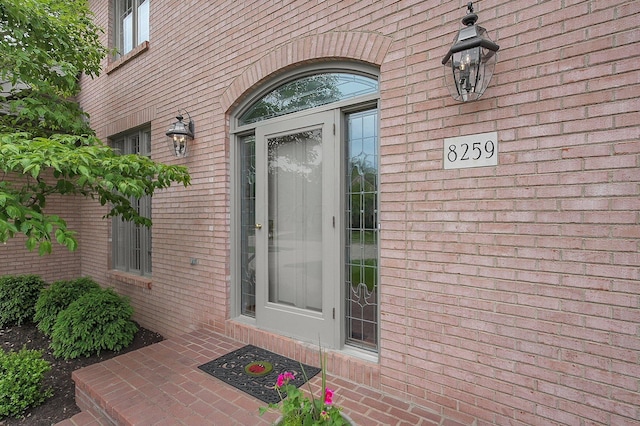 8259 Spruce Needle Ct, Columbus, OH 43235 - doorway to property with brick siding