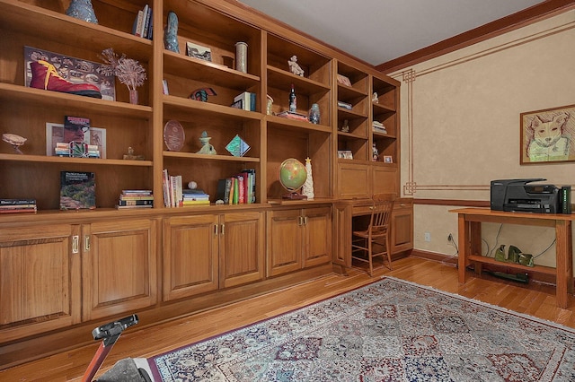 8259 Spruce Needle Ct, Columbus, OH 43235 - office area with light wood-type flooring, crown molding, and baseboards