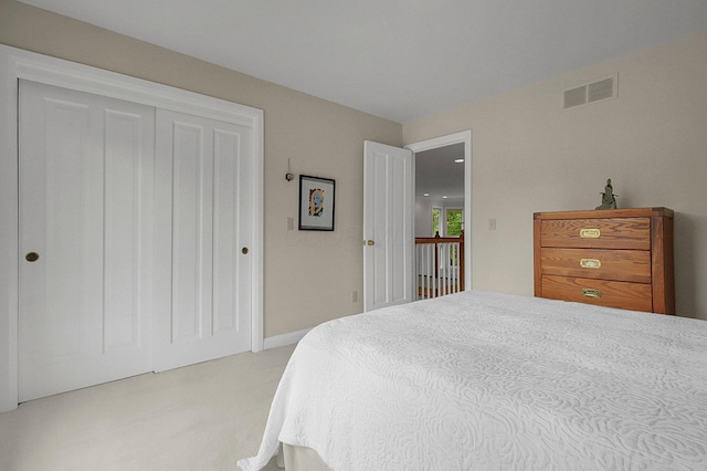 8259 Spruce Needle Ct, Columbus, OH 43235 - bedroom featuring light colored carpet and a closet