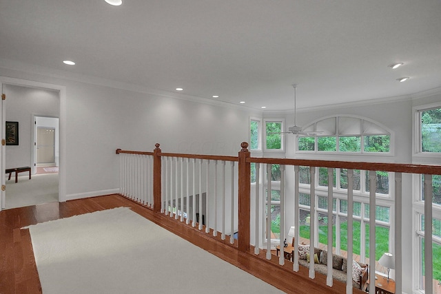 8259 Spruce Needle Ct, Columbus, OH 43235 - hallway with wood finished floors, crown molding, recessed lighting, and baseboards