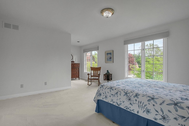 8259 Spruce Needle Ct, Columbus, OH 43235 - bedroom with baseboards and light carpet