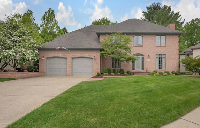 8259 Spruce Needle Ct, Columbus, OH 43235 - view of front of house featuring a garage, brick siding, a chimney, concrete driveway, and a front lawn