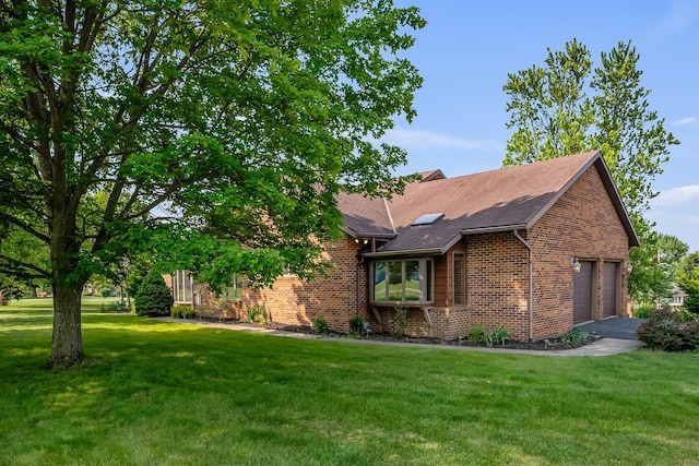 12502 Barbara Dr, Kenton, OH 43326 - view of front of house featuring brick siding, a front lawn, and roof with shingles