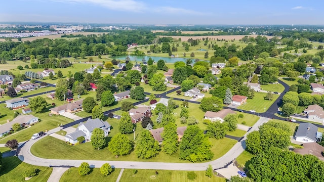 12502 Barbara Dr, Kenton, OH 43326 - aerial view of property's location featuring a nearby body of water and a tree filled landscape