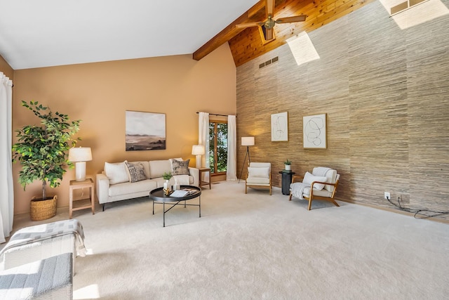 12502 Barbara Dr, Kenton, OH 43326 - living room featuring high vaulted ceiling, beamed ceiling, carpet flooring, and a ceiling fan