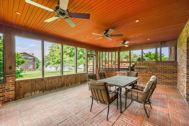 12502 Barbara Dr, Kenton, OH 43326 - sunroom / solarium with ceiling fan, outdoor dining space, and plenty of natural light