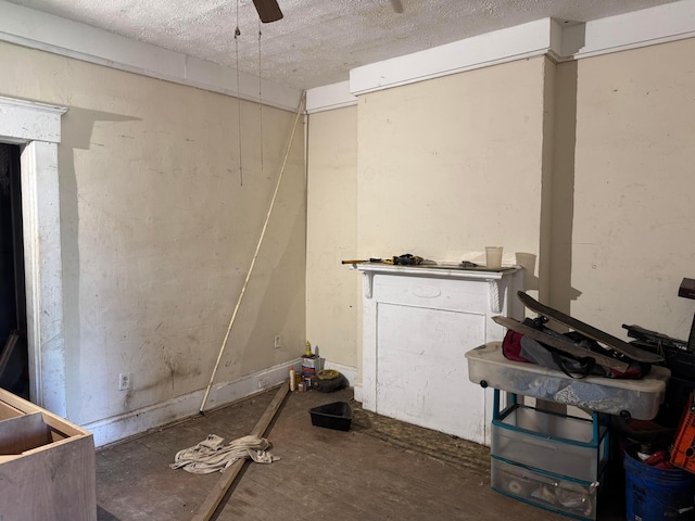 870-872 Sullivant Ave, Columbus, OH 43223 - below grade area with a textured ceiling and ceiling fan