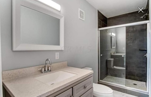 220 E Tompkins St, Columbus, OH 43202 - full bath with toilet, a stall shower, and vanity