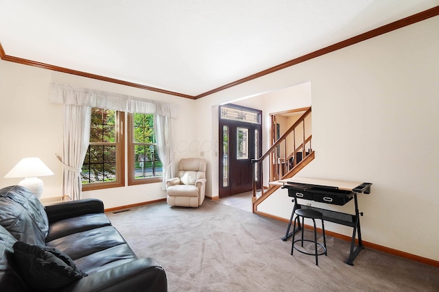 carpeted living area with baseboards, stairway, and crown molding