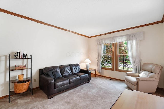 carpeted living area with crown molding and baseboards