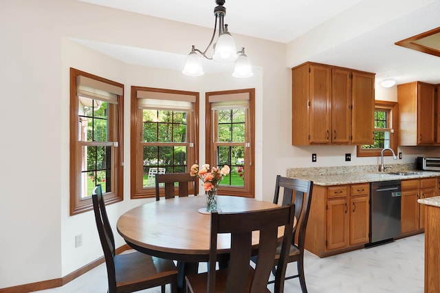 dining area featuring a chandelier