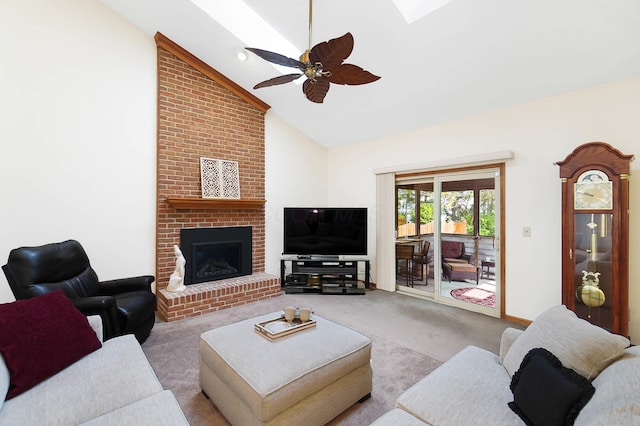 carpeted living area featuring a brick fireplace, ceiling fan, and high vaulted ceiling