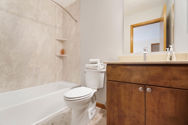 bathroom featuring toilet, vanity, and  shower combination